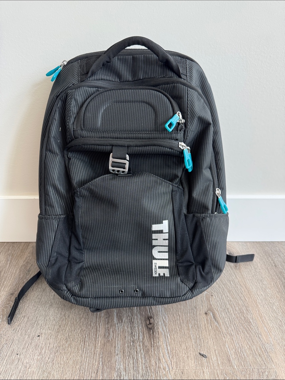 Thule Black Backpack with Teal Zipper Accents - Men Bags